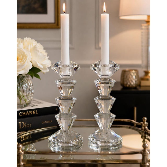 Elevate any interior with this striking pair of Simon Designs faceted crystal candlesticks. Crafted from brilliantly cut...