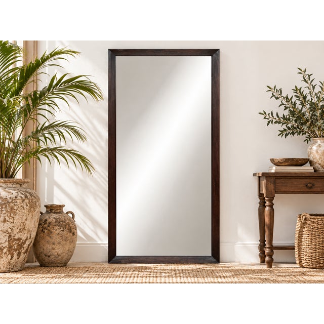 This vintage Indian rosewood mirror, with its elegant architectural frame and full-length design, adds a touch of timeless...