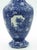 Ceramic blue vase is a decorative object realized in 19th Century by Franz Anton Mehlem. Elegant vase with floral...