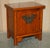 Lovely pair of Chinese elm side table cabinets with oversized brass butterfly doors A very good looking well made and...