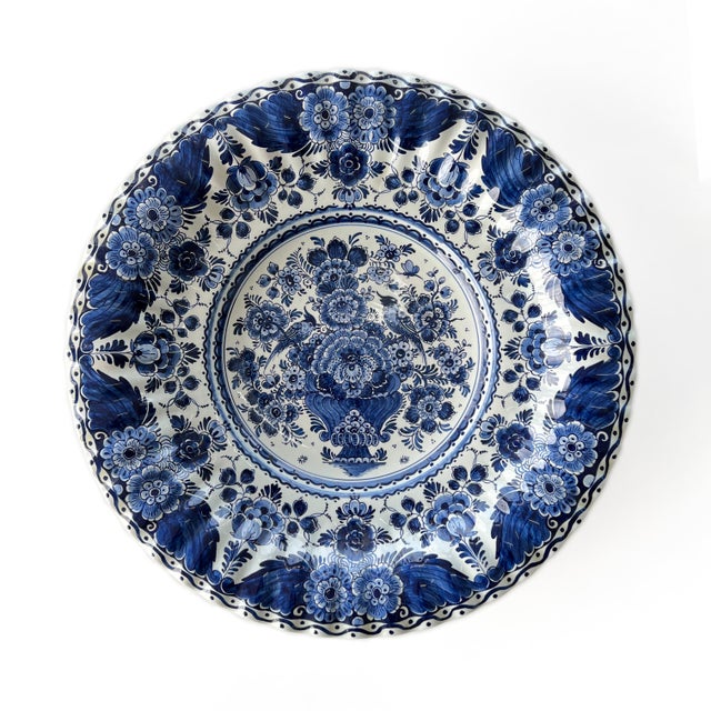 Stunning Delft Blue 18.5" Diameter Wall Platter. This blue Delft collectible wall plate is exquisitely decorated with the...