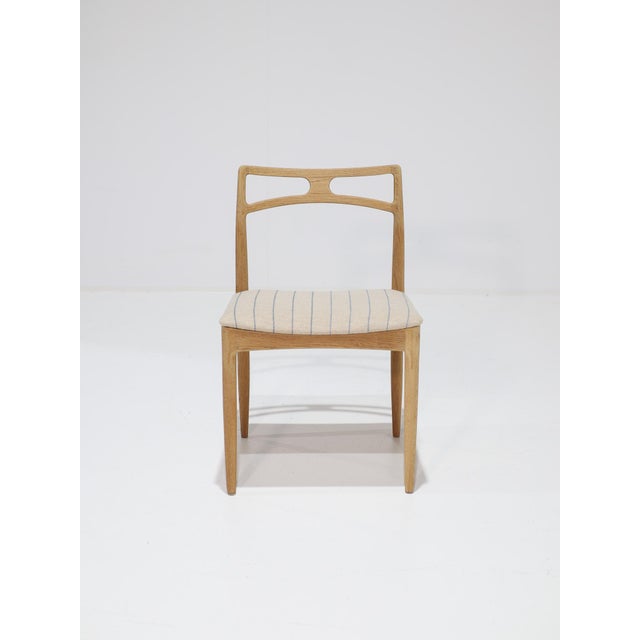 A set of six rare model 94 dining chairs designed by johannes andersen for christian linneberg møbelfabrik in denmark,...