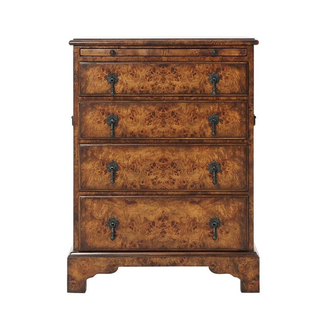 An English Georgian style poplar burl bedside chest, the rectangular molded edge top with a leather inset slide and four...