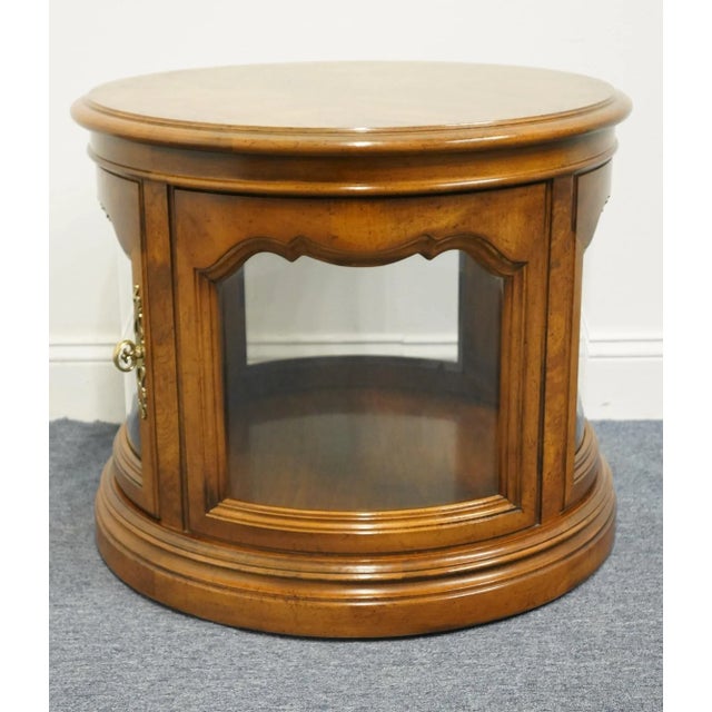 Gordon's Furniture Traditional Style Bookmatched Walnut 25" Round