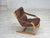 1970s, Swedish design by Åke Fribytter. Armchair in brown furniture leather. Bent beech wood. Manufactured by Swedish...