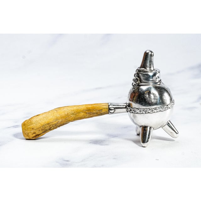 A wonderfully distinctive example of turn-of-the-century smoking accoutrements, this circa 1900 cigar lighter beautifully...