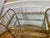 A Classic Three Tiers Brass and Glass Bar/Serving Cart on Wheels. good and solid conditions.