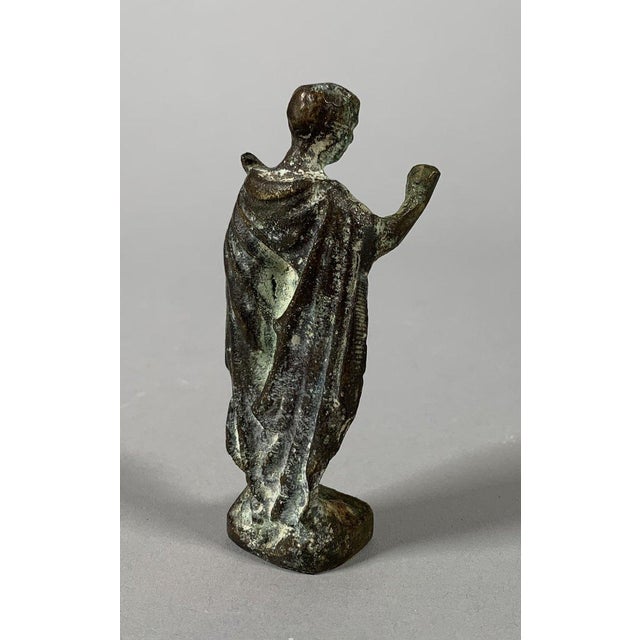 Bronze statuette of a Roman emperor in the style of the ancient Roman period, 1st-2nd century. Bronze with a green-grey...