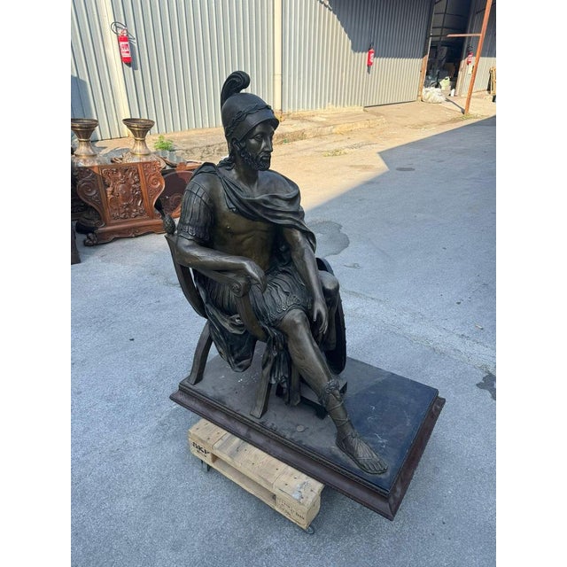 Monumental Roman bronze sculpture 160 cm large bronze sculpture representing a seated roman soldier in life size 160 x...