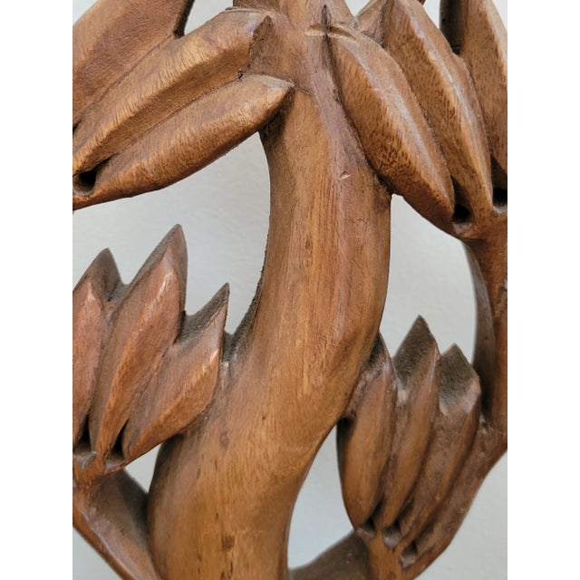 Hand carved teak with foliate form. Lovely abstract modernist style. Reminiscent of some of the work of Pedro Friedeberg....