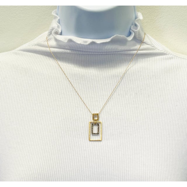 This is part of Chairish’s Fine Jewelry assortment. 0.37ctw 1Beautiful pendant with 0.37 ct. good quality champagne...