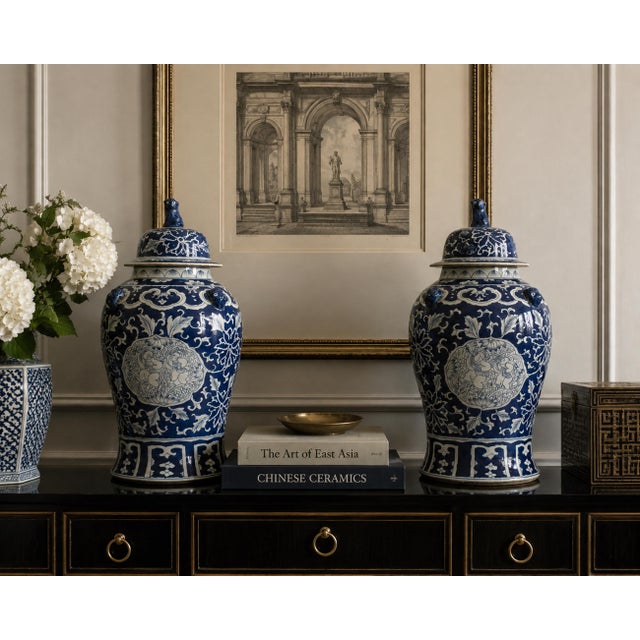Striking pair of large Chinese-style blue and white porcelain temple or ginger jars, each approximately 20 inches tall and...