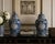 Striking pair of large Chinese-style blue and white porcelain temple or ginger jars, each approximately 20 inches tall and...