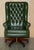 Heritage green leather Chesterfield Tufted Presidents wingback swivel office armchair. A very good looking well made and...