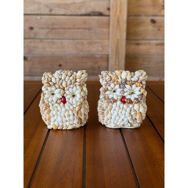 A charming pair of vintage owl figurines completely encrusted in tiny natural seashells. Each little owl was individually...