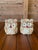A charming pair of vintage owl figurines completely encrusted in tiny natural seashells. Each little owl was individually...