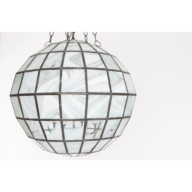 A derivative of our popular wave glass pendant, this geometric piece is both simple and complex in its structure adding a...