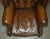 Vintage Pair of Chesterfield Chestnut Brown Leather Wingback Armchairs & Footstools For Sale - Image 9 of 18