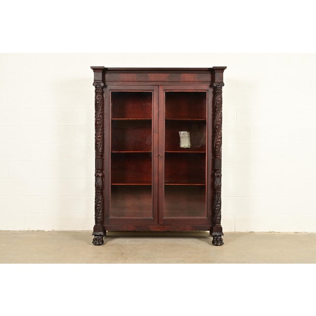 An outstanding antique American Empire or Victorian bookcase cabinet In the manner of R.J. Horner & Co. USA, Circa 1890s...