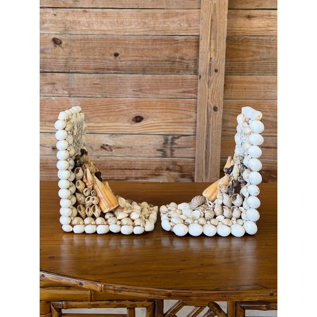 A wonderfully whimsical pair of vintage handcrafted seashell bookends featuring an elaborate arrangement of natural shells...