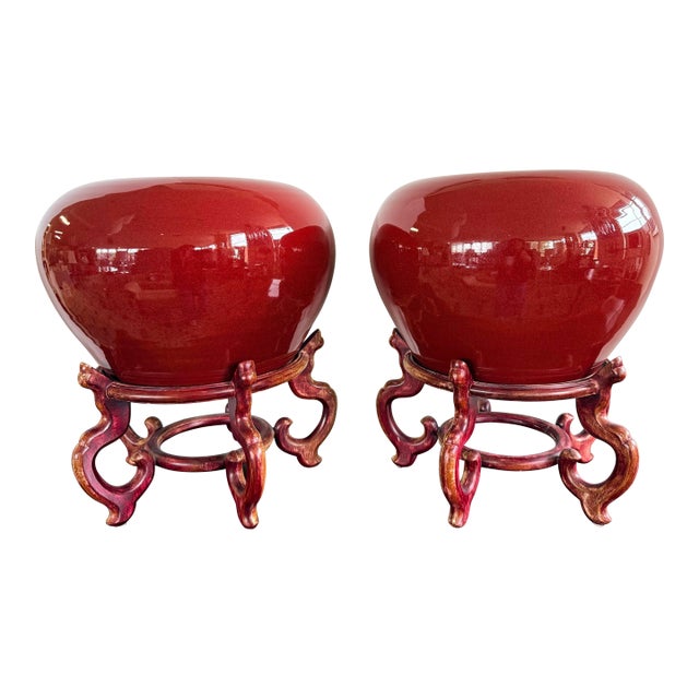Pair of Large Chinese Red Oxblood Porcelain Urns Jardinieres on Carved Stands For Sale