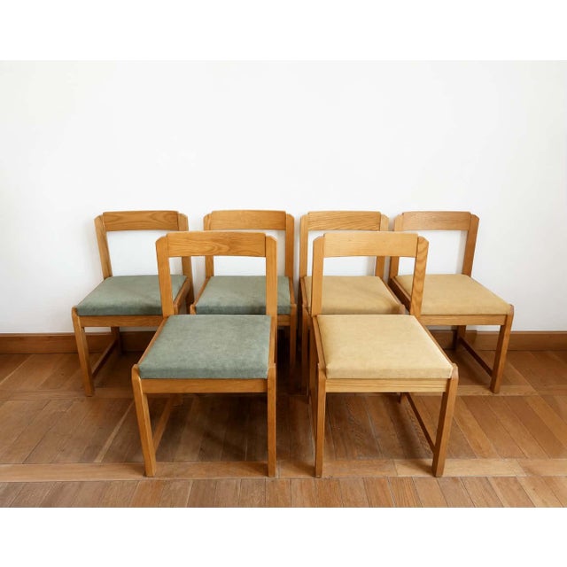 Set of six chairs, Belgian-made in the style of Scandinavian designs circa 1970. Elm wood frame, which provides warmth and...