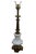 Mid 20th century Hollywood Regency table lamp by Stiffel. Features a round tapered brass pillar and octagonal trophy...