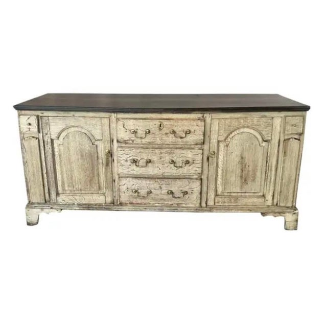 Handsome 19th Century English Oak Sideboard Cabinet. Cabinet is beautifully bleached to reveal the natural grain and...