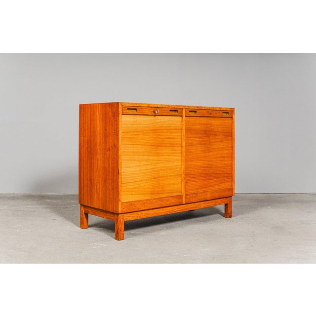 Item: Roll-top cabinet Period & Style: Mid-Century - Mid-20th century Features - Stylish and practical piece of furniture...