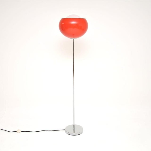 A stylish and very rare vintage Italian floor lamp by Harvey Guzzini. This was made in Italy and dates from around the...