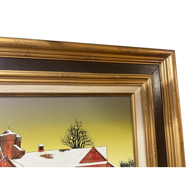 A charming original winter landscape signed H. Hargrove, featuring a picturesque red barn blanketed in fresh snow beneath...