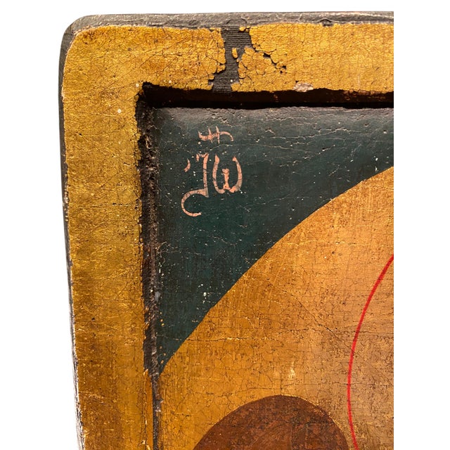 An unusually captivating hand-painted Greek Orthodox icon of Saint John the Baptist (Agios Ioannis Prodromos), rendered in...