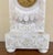 Alabaster Mantel Clock – Floral Decoration An elegant alabaster mantel clock featuring a richly sculpted front with finely...
