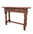 Elegant Spanish console table in the Renaissance Revival style, dating from the early 20th century. The piece features a...