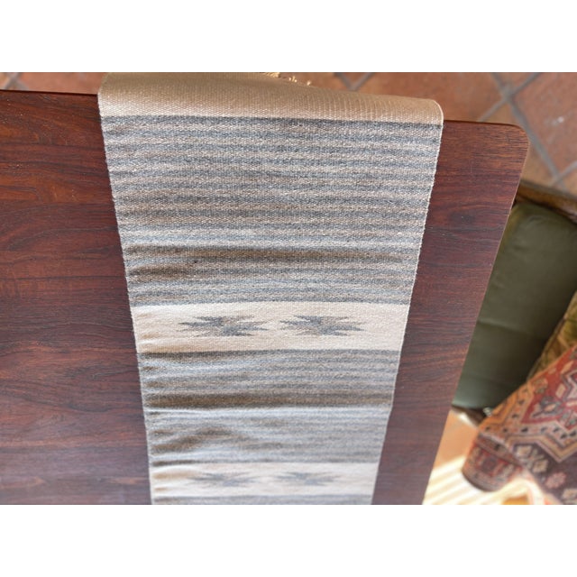 Vintage New Mexican Ortega wool Chimayo tapete weaving with a beige background and multiple shades of gray and blue for...