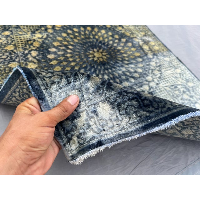 This exquisite vintage Turkish hand-knotted silk rug features an intricate medallion design in soft shades of blue,...