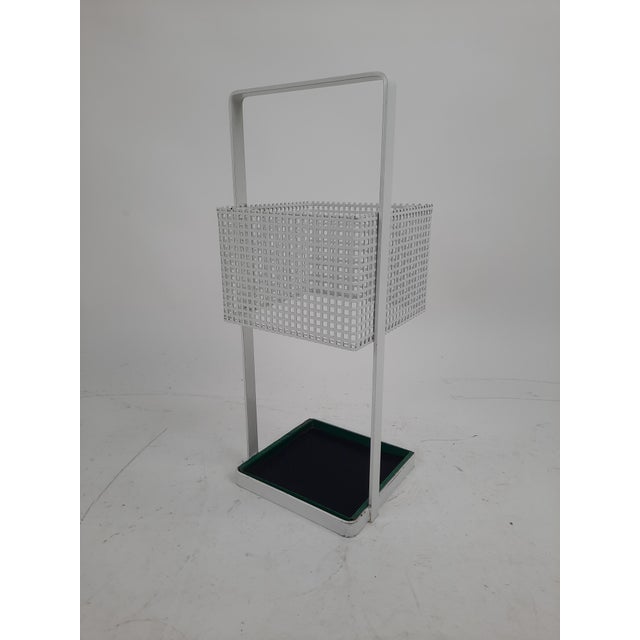 This modernist square umbrella stand of white powder-coated metal is a rare design classic, from Josef Hoffmann for...
