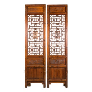 Pair of Antique Chinese Carved Elm Lattice Screens with Figural Motifs For Sale