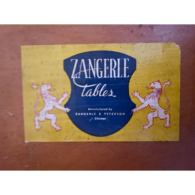 A refined and character-rich vintage coffee table by Zangerle & Peterson, Chicago. Dating to the 1920s–1940s, this...