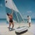 Boating In Antigua 1961 by Slim Aarons Slim Aarons Limited Estate Edition American actor Hugh O’Brian (left) hoists the...