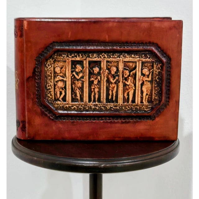 Elevate your cherished memories or creative projects with this luxurious Italian leather photo/scrapbook by The Museum...