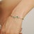 Contemporary Twin Emerald & Diamond Halo Open Cuff Bangle Bracelet in Sterling Silver For Sale - Image 4 of 11