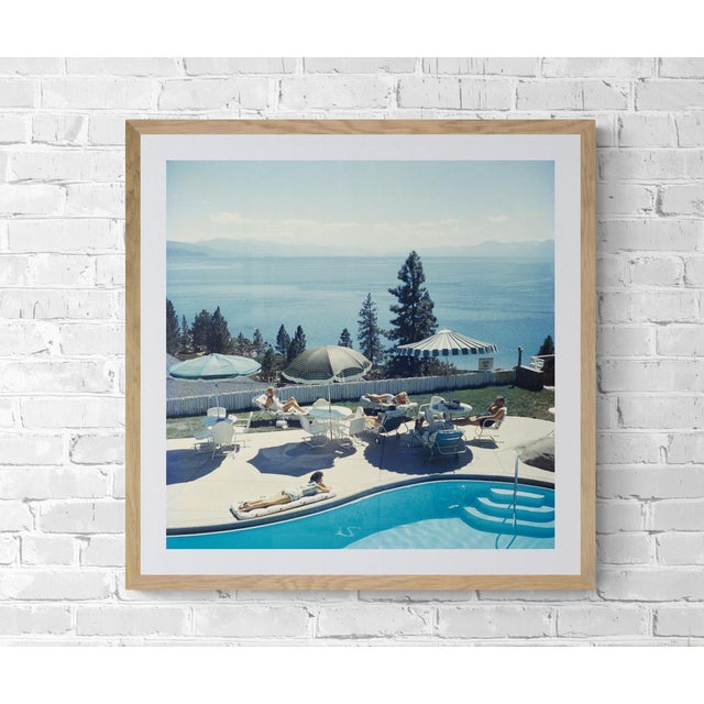 Guests at a swimming pool at the Cal Neva Lodge on the shore of Lake Tahoe, USA, 1959. As an authorized Getty Images...