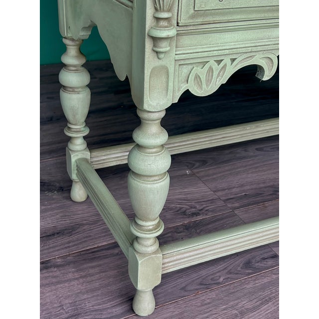 This is a solid built Spanish style console cabinet with a single large drawer The top is refinished in a natural tone...