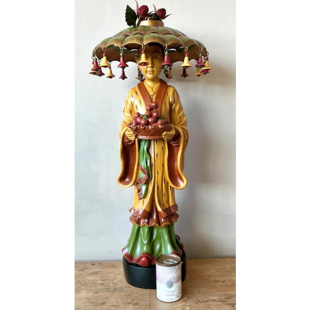 Discover the exquisite charm of this vintage hand-carved Asian figure, beautifully adorned with an intricate umbrella hat,...