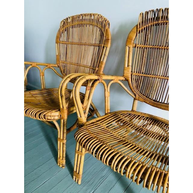 Truly exceptional pair of extremely well made and sturdy bamboo and rattan chairs. I couldn't find a similar image online,...