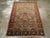 This Early 20th century Turkish Sivas rug, measuring 3' 11" x 5' 6", is a striking example of Ottoman-era weaving...