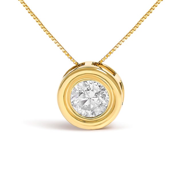 Immerse yourself in the understated elegance of this meticulously crafted pendant necklace, forged in the warm glow of 14K...