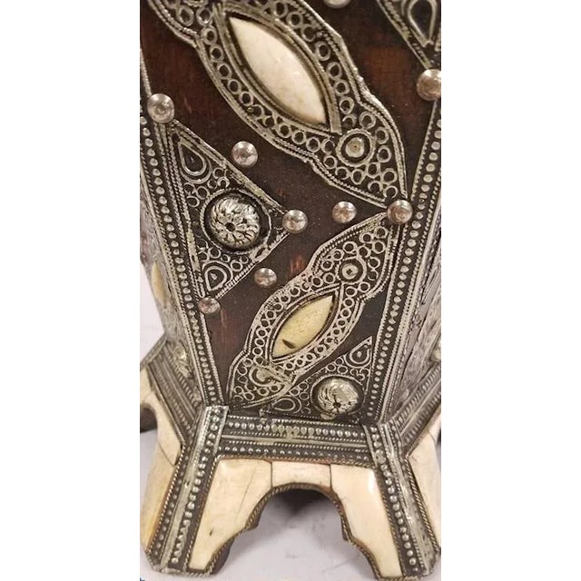 (YOU CAN MAKE REASONABLE OFFERS). This ornate decorative vase is made of wood on which metal and bone has been inlaid. The...