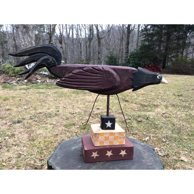 Wonderful Americana wood carved Folk Art Rooster on stand.